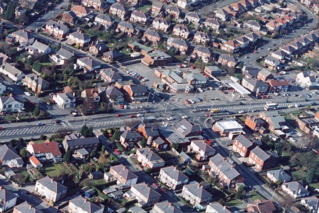 This aerial photograph taken in 1994 shows a length of Garstang Road and its junction with Black Bull Lane in Preston