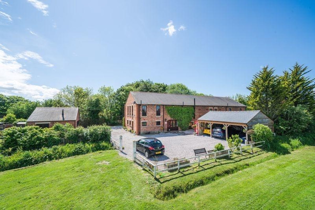 Stupendous farmhouse with sauna, gym, suits of armour, and lake in the sprawling garden yours for £1.2m