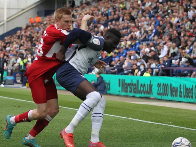 Preston North End defender Bambo Diaby holds off a challenge from Middlesbrough; Duncan Watmore