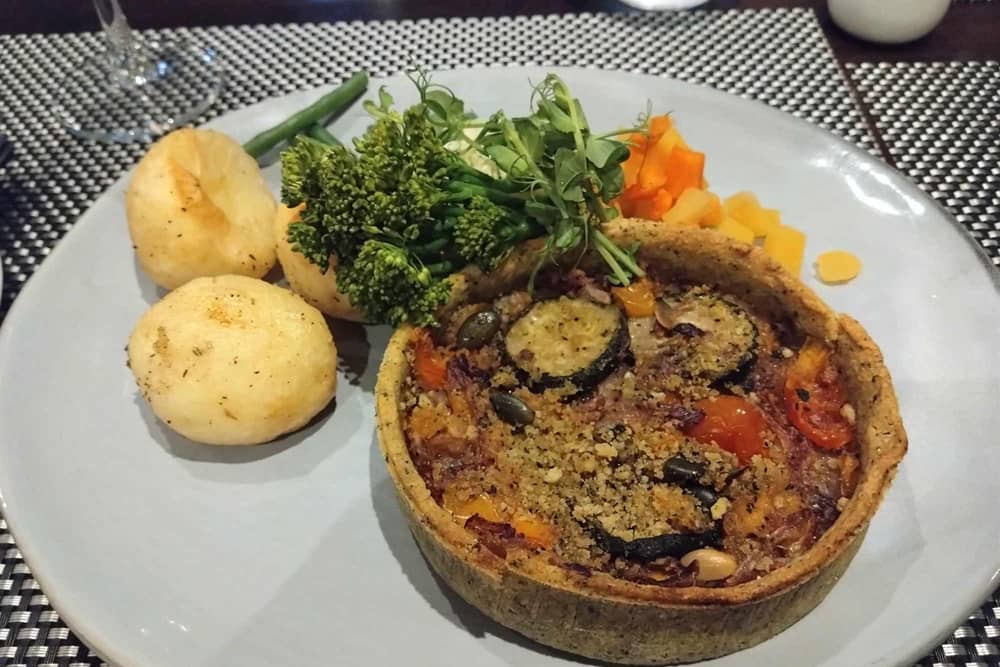 Mediterranean vegan tartlet, which comes with Sunday roast trimmings and the choice of being topped with brie, served at The Lawrence in Padiham.