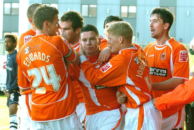 Adam Hammill celevrates scoring the opening goal of the game.