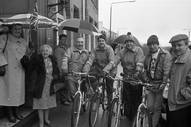 Four members of Chorley Rotary Club set themselves a gruelling challenge by riding 20 miles along bridleways and roads in Rivington Moor, Horwich, Belmont and Winter Hill - all to raise money for the Rotary International Polio Plud fund. Here they are being waved off from Chorley's Town Hall by the mayor Coun Mrs Edna Shone.