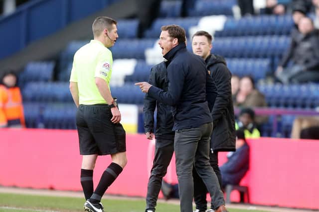 Bournemouth manager Scott Parker remonstrates with referee Matt Donohue during the game against Preston North End at Deepdale
