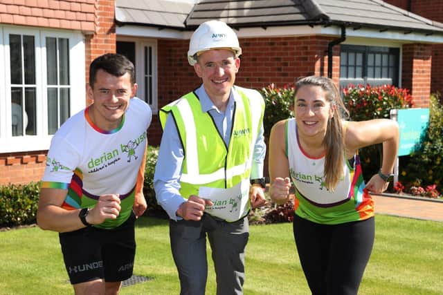 Anwyl’s Richard Bergin, John Sutton and Hannah George are raising money for Derian House