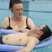 Homecare Assistant Jackie McPherson taking client Xavier Spragg swimming