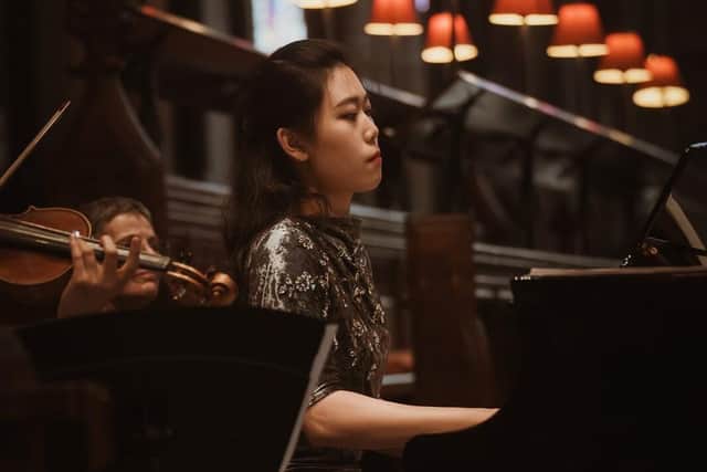 Siqian Li at last year's festival. She will attempt to play every acoustic piano in the city centre 