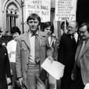 Frank Clifford, who has died at the age of 87,  outside the High Court, in 1978 to protest against the ban on him walking his dog in his local park in Burnley. The council obtained an injunction against him which he defied, hence his appearance at the High Court in London.  (Photo by Steve Burton/Keystone/Getty Images)
