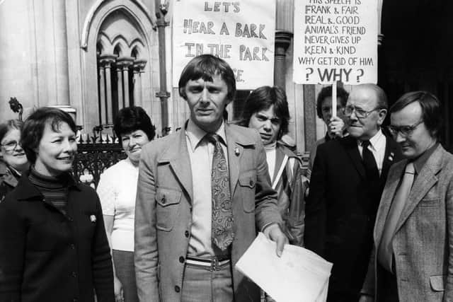 Frank Clifford, who has died at the age of 87, outside the High Court, in 1978 to protest against the ban on him walking his dog in his local park in Burnley. The council obtained an injunction against him which he defied, hence his appearance at the High Court in London. (Photo by Steve Burton/Keystone/Getty Images)