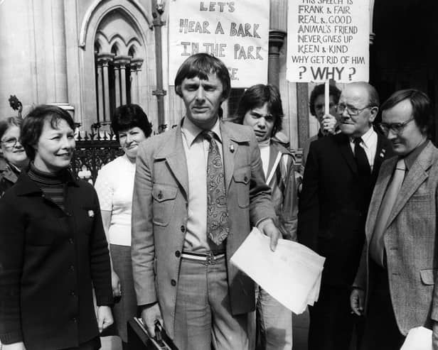 Frank Clifford, who has died at the age of 87,  outside the High Court, in 1978 to protest against the ban on him walking his dog in his local park in Burnley. The council obtained an injunction against him which he defied, hence his appearance at the High Court in London.  (Photo by Steve Burton/Keystone/Getty Images)