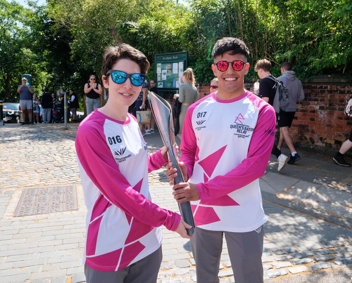 Queen's Baton Relay travels through Preston with many holding it aloft