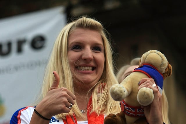 Double Olympic swimming gold medal winner Rebecca Adlington waves to the crowds as she tours Mansfield following her Beijing 2008 glory. At the 2012 London Olympics, Adlington added to her tally with bronze in the 400-metre freestyle and another bronze in the women's 800-metre freestyle in a time of 8:20.32.