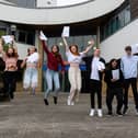 (l-r) Jada, Paris, Beth, Marina, Kacie, Arran, Leon and Jack celebrate their GCSE results at Fulwood Academy. Photo: Kelvin Stuttard