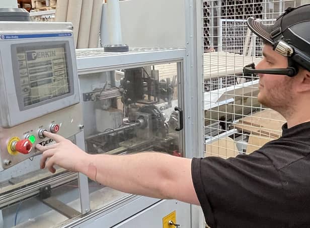 Made Smarter says Lancashire manufacturers must over come barriers to going digital. Here a machine operator at JTAPE tests out handsfree smart glasses
