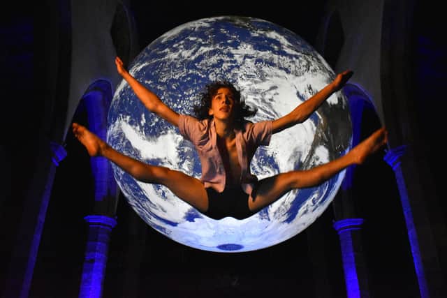 Jumping for joy, Sieberen Granger in front of Gaia at Lancaster Priory. Photo by Darren Andrews.