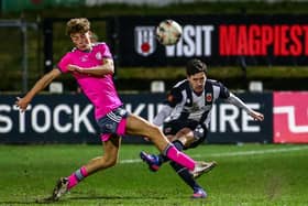 Adam Blakeman plays the ball down the line against Boston United (photo: Stefan Willoughby)