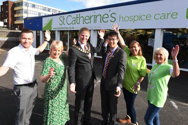 LANCASHIRE POST - 24-09-22 Staff and volunteers at the opening of the new St Catherine's Hospice Care charity shop, the city shop was officially opened by the Mayor of Preston, on Corporation Street, Preston. from left, store manager Scott Strang, Carole Hoyle, Mayor of Preston Coun Neil Darby, consort Dan Leung, Lorraine Charlesworth and Carol Poole.