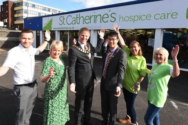 LANCASHIRE POST - 24-09-22 Staff and volunteers at the opening of the new St Catherine's Hospice Care charity shop, the city  shop was officially opened by the Mayor of Preston, on Corporation Street, Preston.  from left, store manager Scott Strang, Carole Hoyle, Mayor of Preston Coun Neil Darby, consort Dan Leung, Lorraine Charlesworth and Carol Poole.