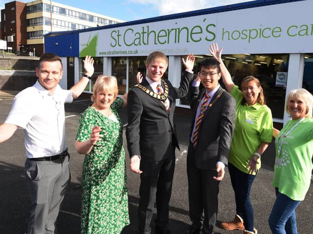 LANCASHIRE POST - 24-09-22 Staff and volunteers at the opening of the new St Catherine's Hospice Care charity shop, the city  shop was officially opened by the Mayor of Preston, on Corporation Street, Preston.  from left, store manager Scott Strang, Carole Hoyle, Mayor of Preston Coun Neil Darby, consort Dan Leung, Lorraine Charlesworth and Carol Poole.