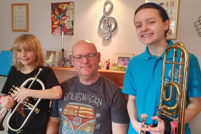 Joshua (9), John, and Jasmine (14) Squires-Evans - a musical family from Hambleton