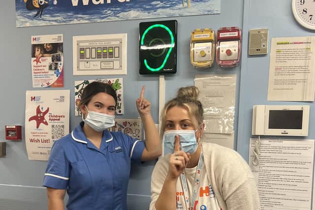 Watching their noise on the Children’s Ward are Rebecca (right) with paediatric staff nurse Lauren Carus