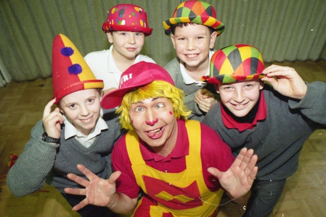 Born performer Yuri can teach children a thing or two about clowning around. He grew up in the circus and is now passing on the tricks of the trade to youngsters through a series of skills workshops - like this one at St Peter's CE School in Fulwood, Preston. Yuri is pictured with pupils (from left) Dean Sumner, 10; Dean Ash, 11; Tim Bowerman, 11l and Martin Speariett, 11