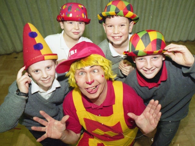 Born performer Yuri can teach children a thing or two about clowning around. He grew up in the circus and is now passing on the tricks of the trade to youngsters through a series of skills workshops - like this one at St Peter's CE School in Fulwood, Preston. Yuri is pictured with pupils (from left) Dean Sumner, 10; Dean Ash, 11; Tim Bowerman, 11l and Martin Speariett, 11