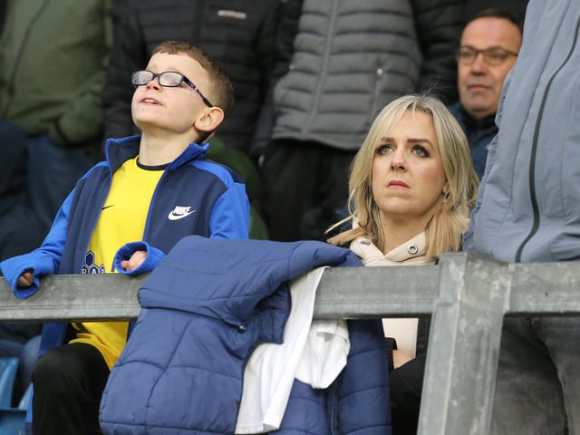 Preston North End fans anxiously watch the second half action