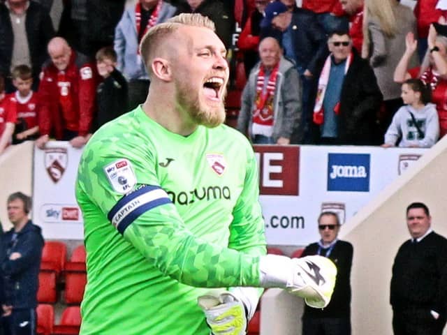 Connor Ripley celebrates Morecambe's victory over Lincoln City last weekend Picture: Michael Williamson
