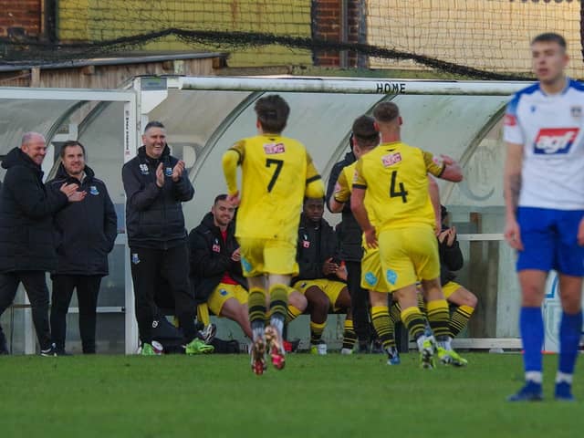 Bamber Bridge boss Jamie Milligan applauds after Sheldon Green's 13th-minute opener against Guiseley (photo: Ruth Hornby)