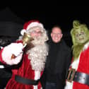 Coronation Street's Antony Cotton pictured with Santa and the Grinch