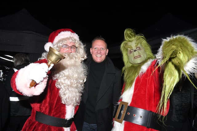 Coronation Street's Antony Cotton pictured with Santa and the Grinch