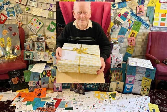 Billy surrounded by all of his birthday cards