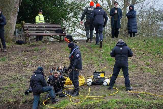 Almost a week later, police cordoned off the bench as specialist divers returned to search the river again (Credit: Peter Byrne/ PA)