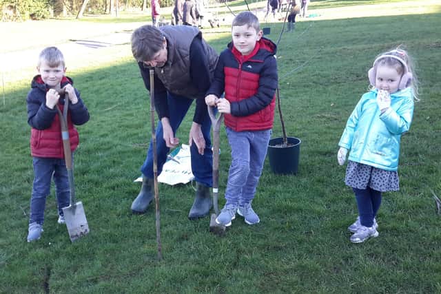 All age groups helped plant Longridge's new Community Orchard