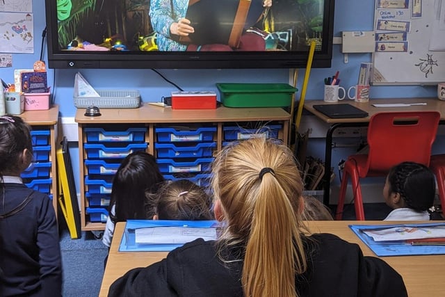 Children watching a Stories for Schools digital library video