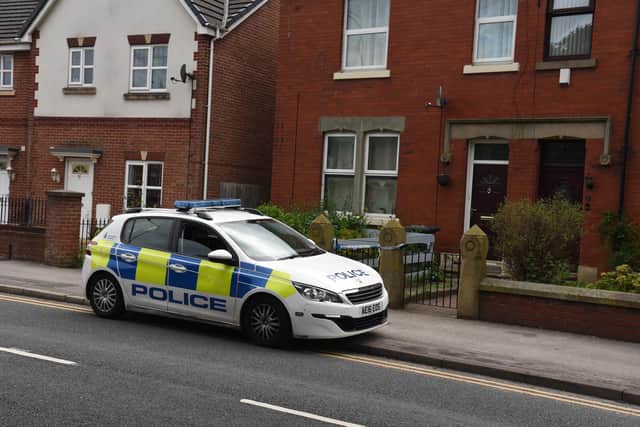 Police at the scene of a murder investigation after the body of a woman was found at the address non Sharoe Green Lane, in Preston's Fulwood area. Photo: Neil Cross