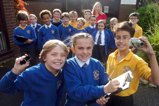 Harry Leathan, Ellie Jai Miller, Elliot Chase, and the St Peter's Catholic Primary School news team in Lytham