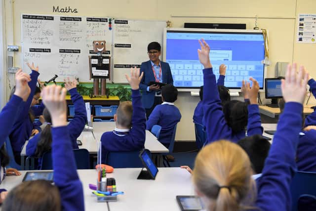Jay teaching the Eldon pupils how to code.