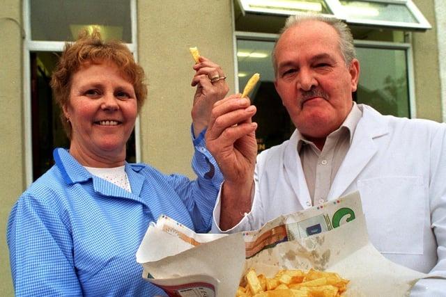 Dereck and Irene Billington outside their chip shop in Ripon street, Preston in 1996, before it was taken over by Mark Noblett who is also featured in this gallery