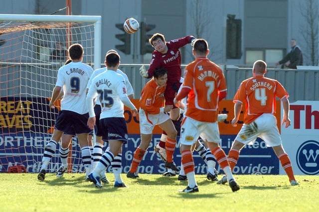 Preston North End's Andy Lonergan goes for the ball against Blackpool at Bloomfield Road.