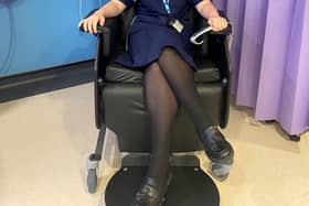 Ward 4 manager Lea Cottle tests the new motorised recliner that is for breast cancer patients undergoing DIEP reconstruction surgery
