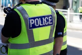 A man suffered "serious head injuries" after an e-bike and a car collided in Accrington