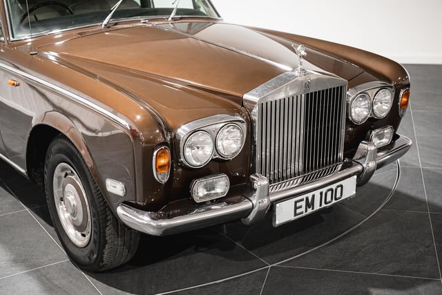 The Rolls Royce Silver Shadow owned by Eric Morecambe is finished in a walnut brown. Picture from Iconic Auctioneers.