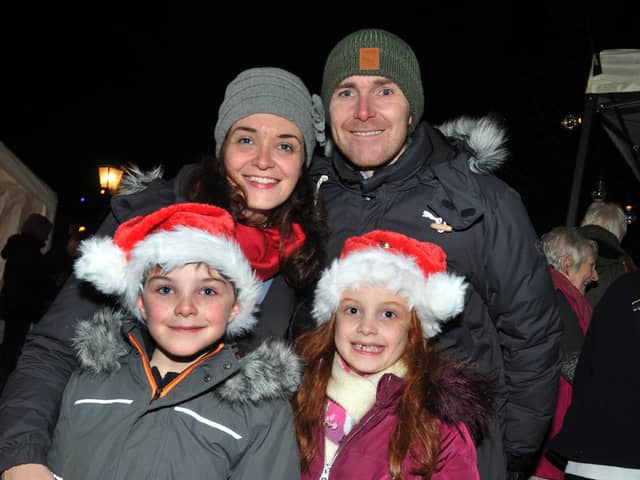 Longirgde does Christmas 2018: Julie and Graham Mitton with twins Thomas and Eva, eight, have fun at the Longridge Does Christmas event, at Longridge Station.