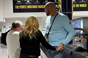 Tyson Fury with wife Paris after landing back in Manchester from their family holiday in Tenerife.