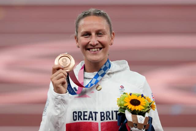 Great Britain's Holly Bradshaw celebrates with the bronze medal at the Tokyo Olympics