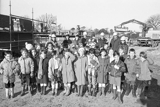 Young students donned their wellies to go on an unusual school outing - to a building site. And the guided tour of the development proved as popular as the more traditional days out to the zoo. Pictures are pupils of St Clare's Primary School, Fulwood, who visited the POCO homes site as part of a project on buildings