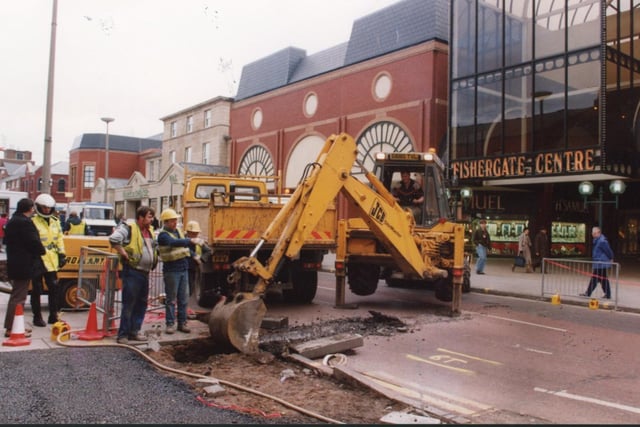 Workmen dig up the road outside the Fishergate Centre in 1991