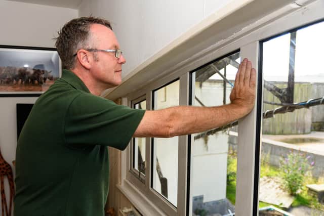 Animal Manager at Blackpool Zoo Mike Woolham inside his apartment at the zoo which overlooks the Camel enclosure. The keeper flats are located in a former air traffic control tower, which dates back to 1931 when the site was Blackpool Municipal Airport. Photo: Kelvin Stuttard