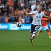Preston North End's Brad Potts and Blackpool's CJ Hamilton.
